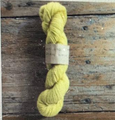 Bright yellow colored yarn